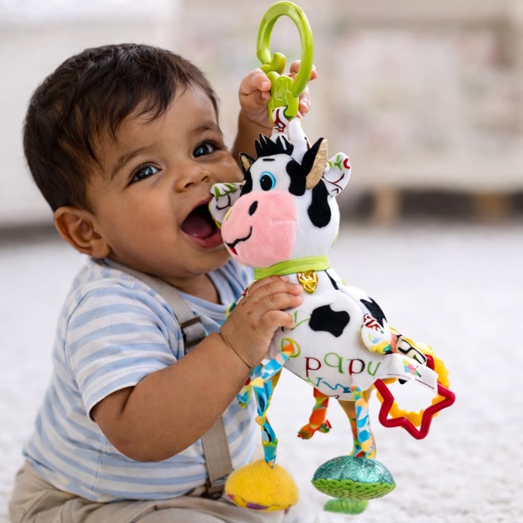 Balibazoo Caesar The Cow Hanging Toy - Developmental Sensory Rattle for Babies 0-24 Months | Vibrating Pull, Crinkle Sounds, BPA-Free Teether | Clips to Stroller, Car Seat | Soft Plush Baby Toy