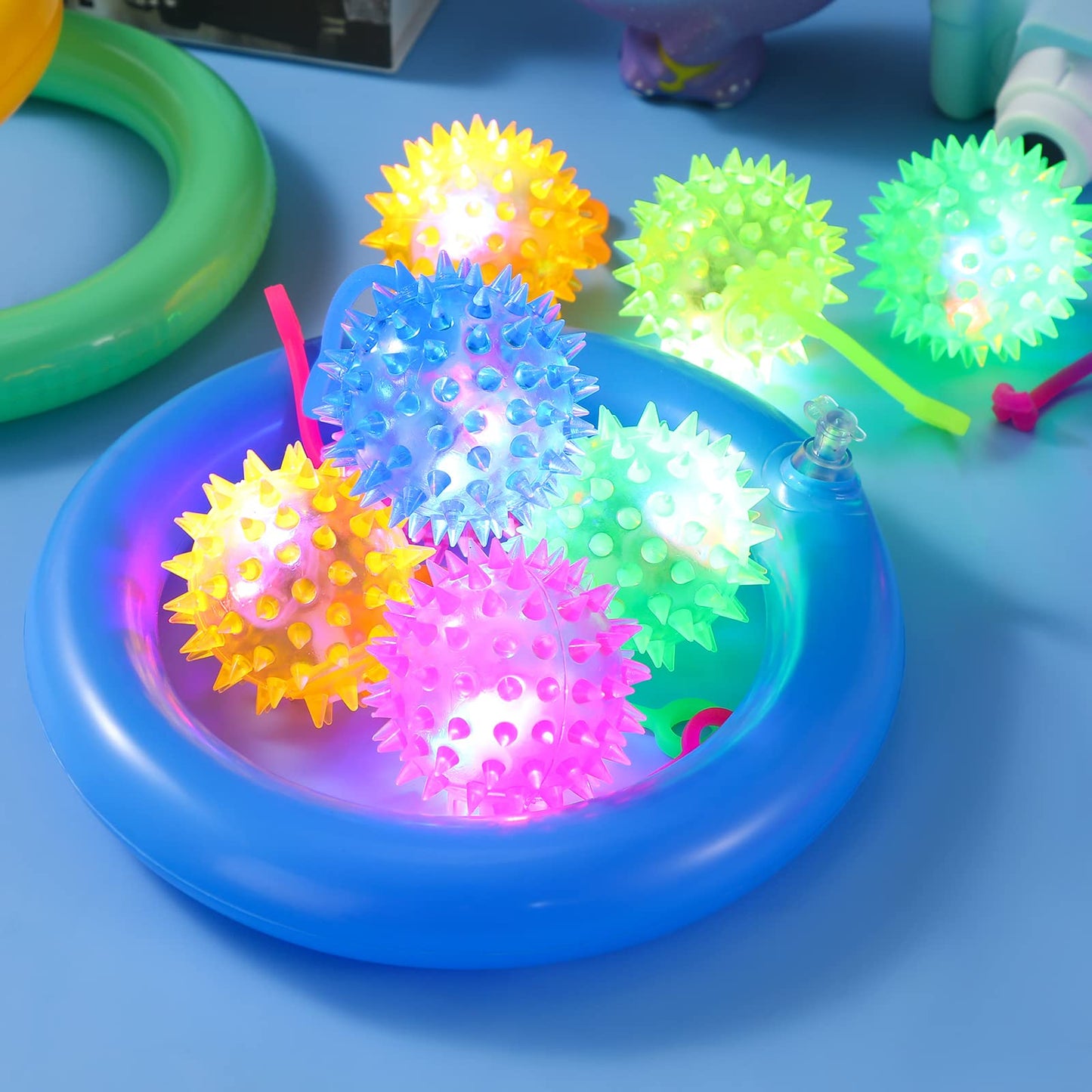 Sotiff 200 Pcs Light up Ball Spiky LED Bouncy Ball Flashing Squeaky Multicolor Puffer Toy Rubber Sensory Toy Carnival Prizes Bulk Party Favors for Teens, Adults, Children
