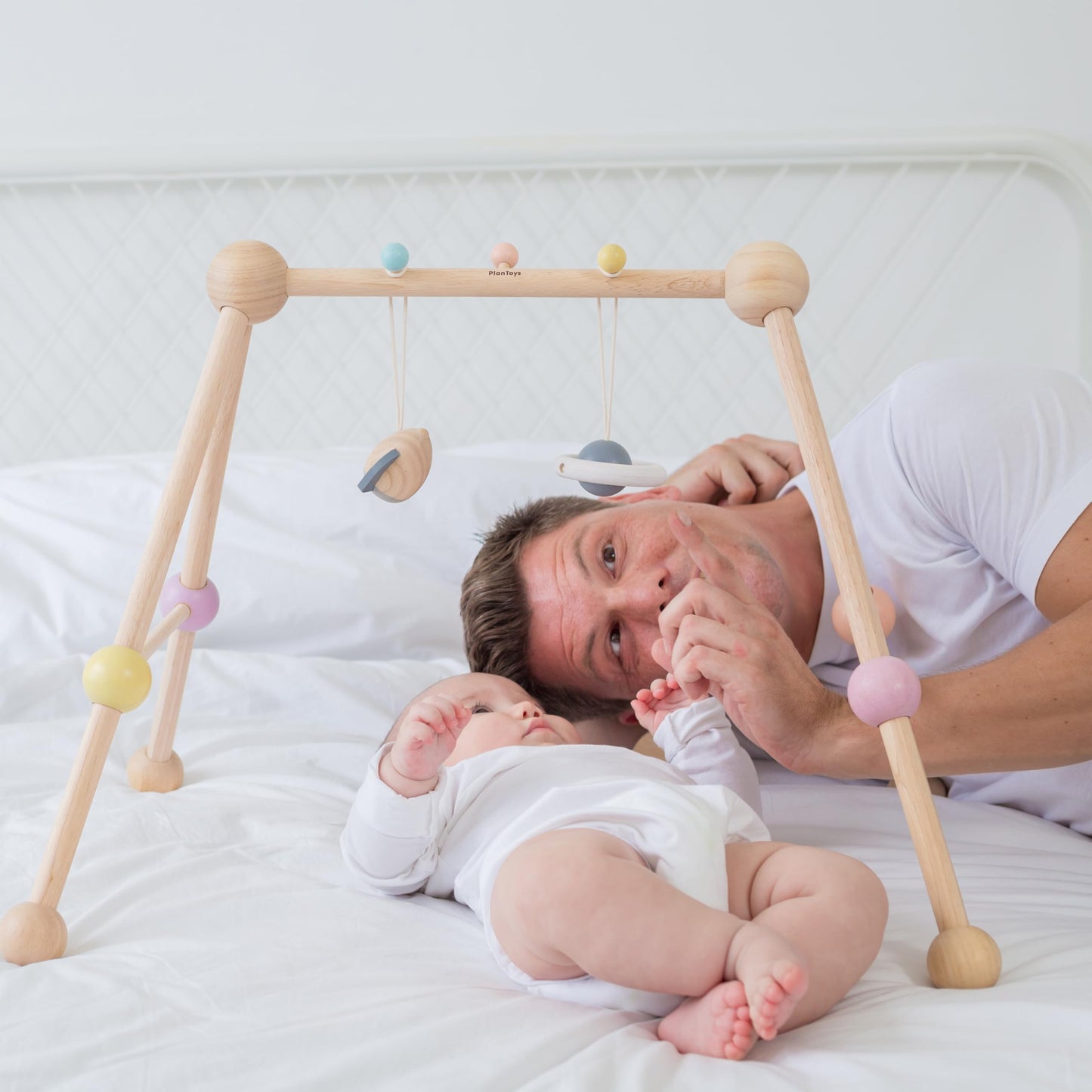 PlanToys® Play Gym Wooden Baby Activity Toy in Pastel Colours | Montessori Sensory Play for Motor Skills, Coordination & Focus | Eco-Friendly Developmental Gym