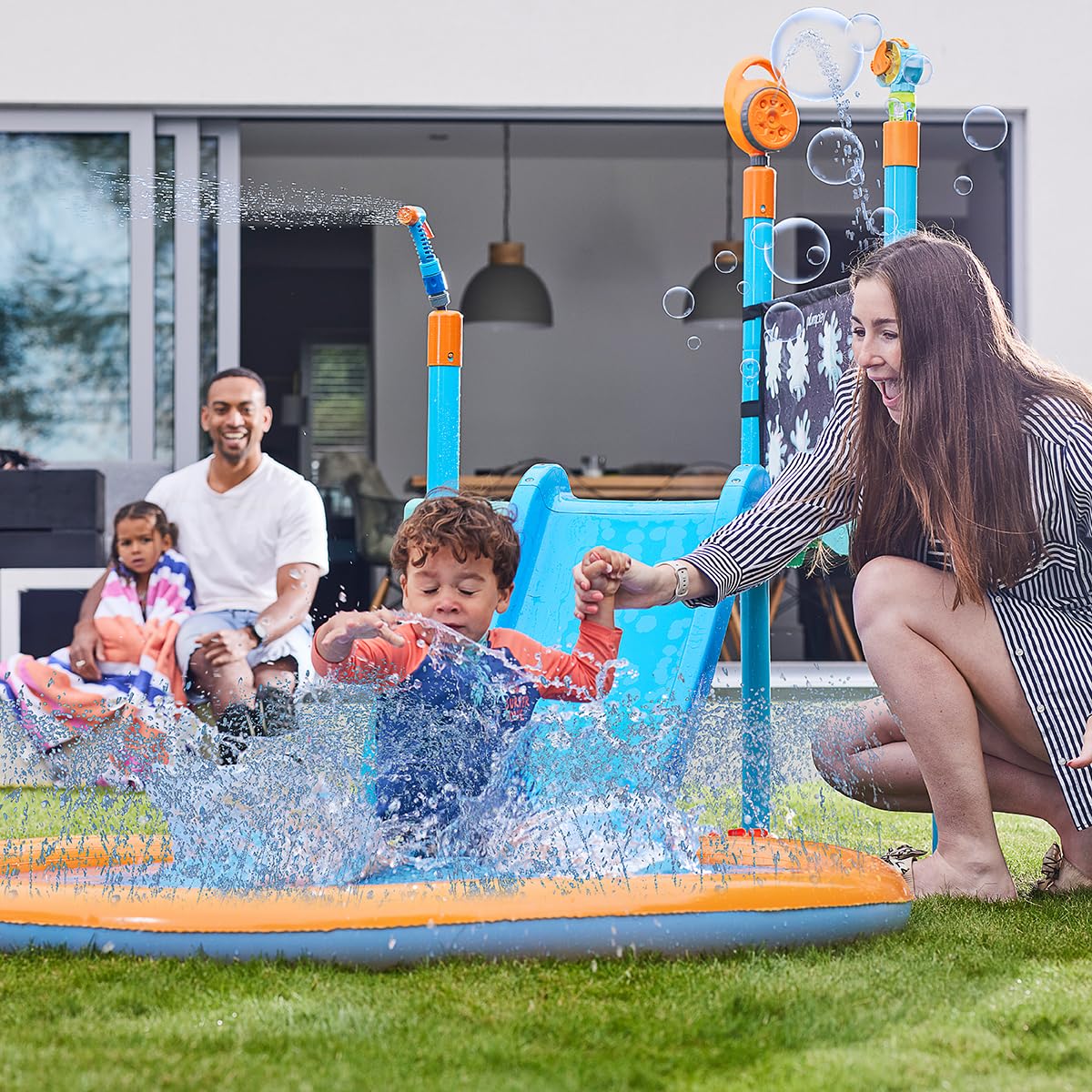 Plum Play Kids Splash Pad Station Water Slide Play Equipment - Outdoor Toddler Water Toys, Sprinkler Pool for Kids, Fun Backyard Water Park with Bubble Blower, Water Reveal Coloring Wall Ages 3 Years+