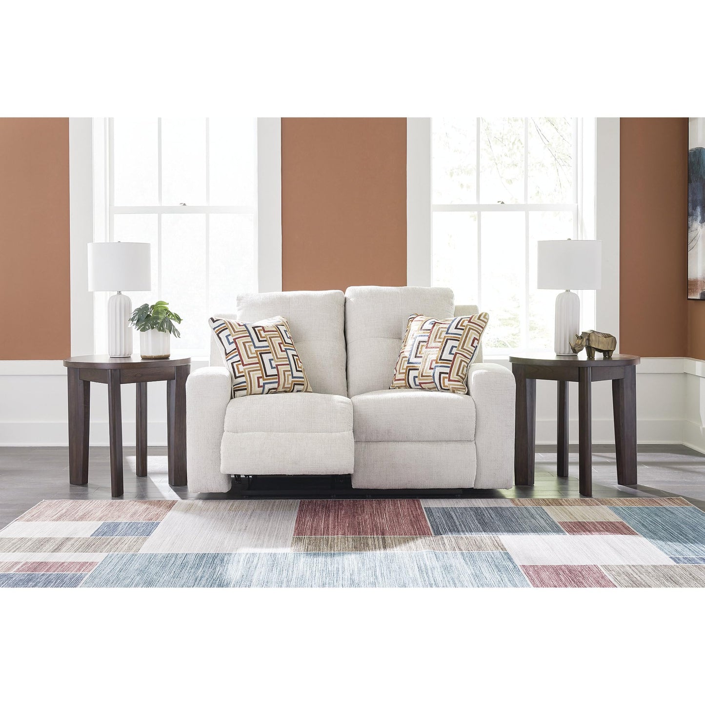 Signature Design by Ashley Danum Modern Tufted Manual Reclining Loveseat with 2 Accent Pillows, Beige